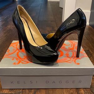 Black Patent leather heels.